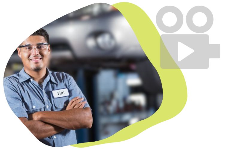 Happy auto technician using walkaround video